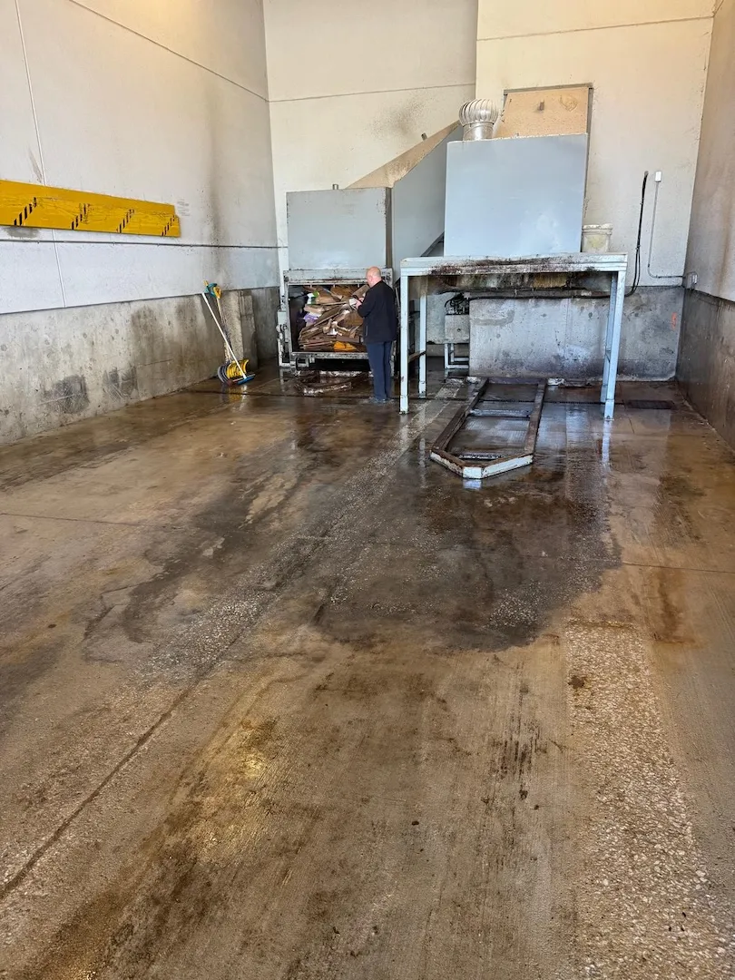 Clean compactor area after high-pressure cleaning by GPM Cleaning Services in the GTA