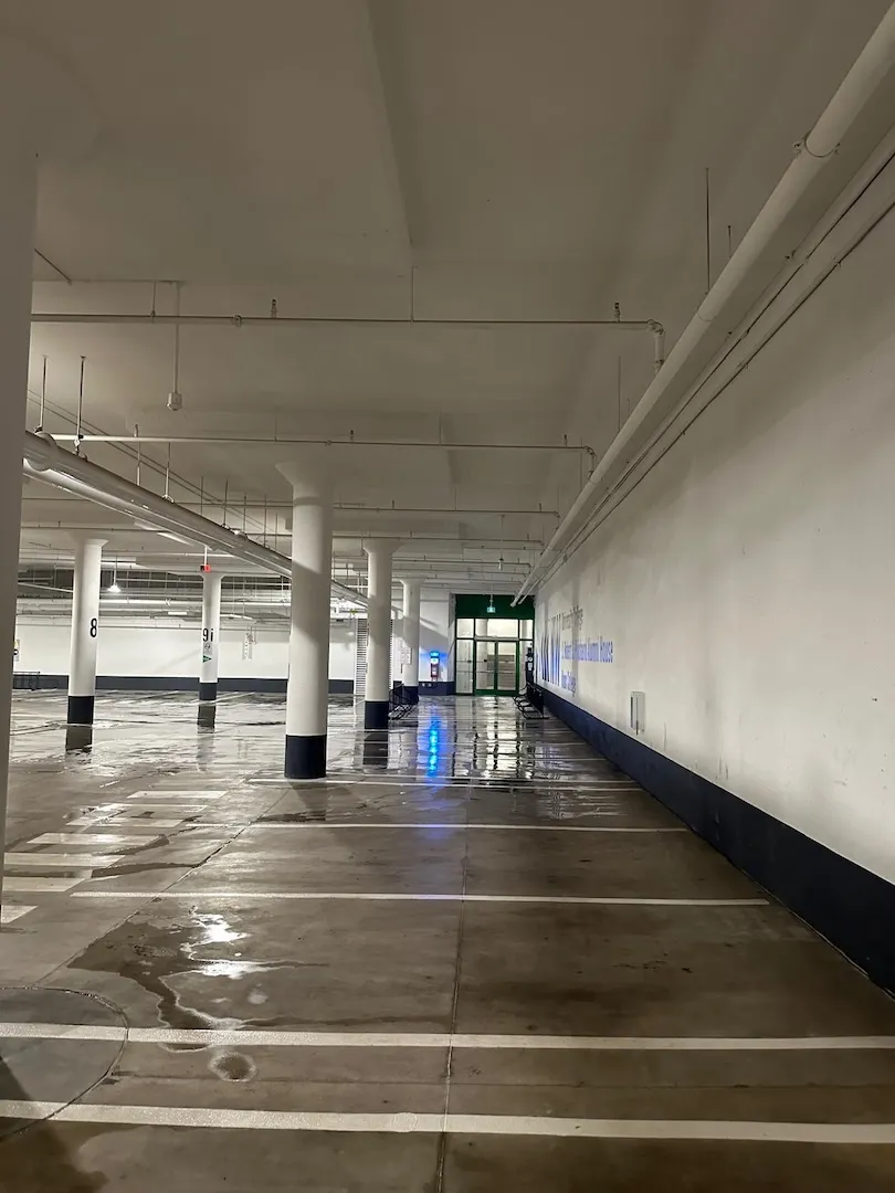 Spotless underground garage floor after pressure washing